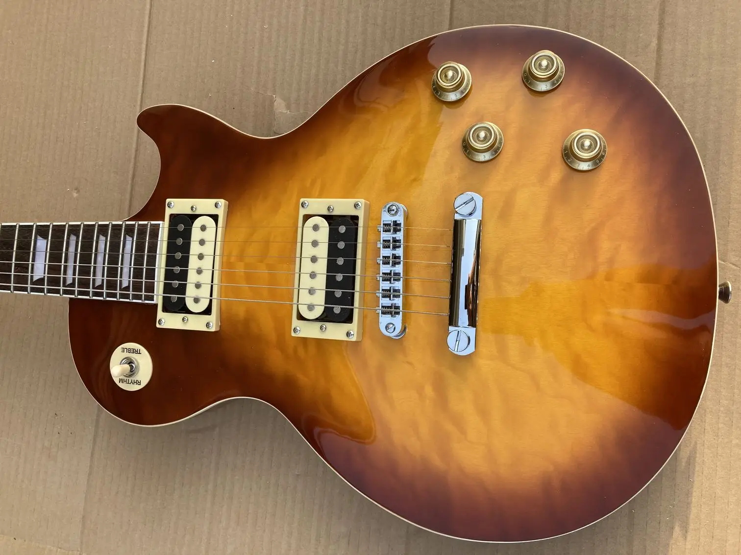 

Top Quality Flame Maple Top G Standard Electric Guitar LP Standard Guitar in stock Same in real photos 2024