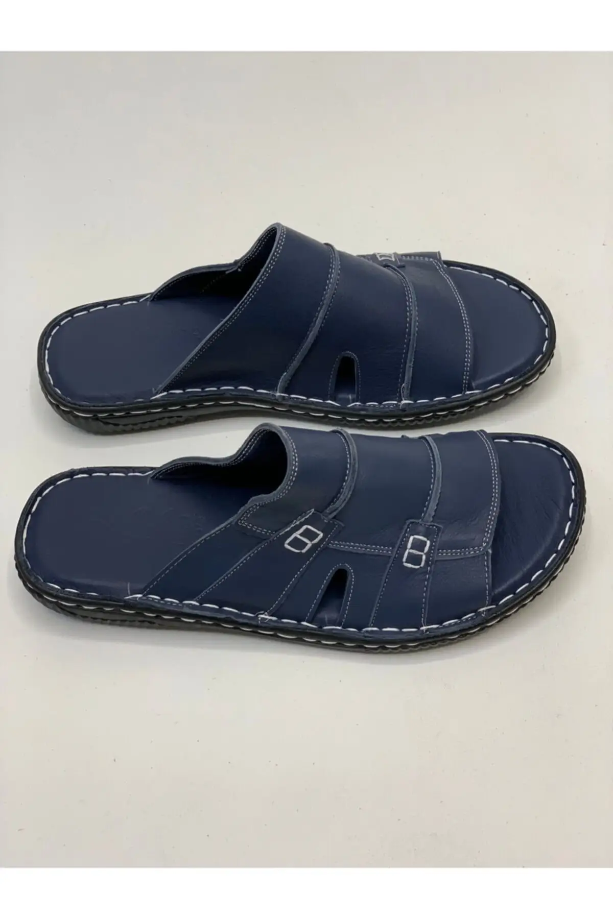 

Мужские тапочки из натуральной кожи темно-синего цвета