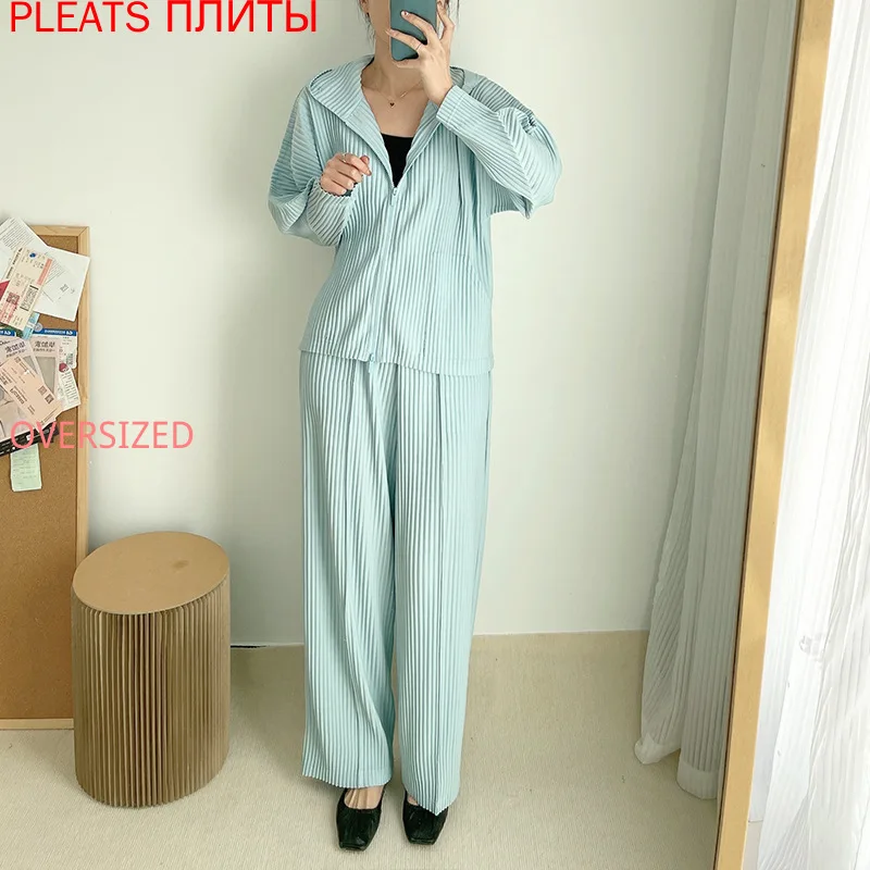 

Модный повседневный костюм для женщин; Коллекция 2022 года; Сезон весна-осень; Новинка; Miyake; Пальто на молнии с капюшоном; Широкие брюки; Костюм...