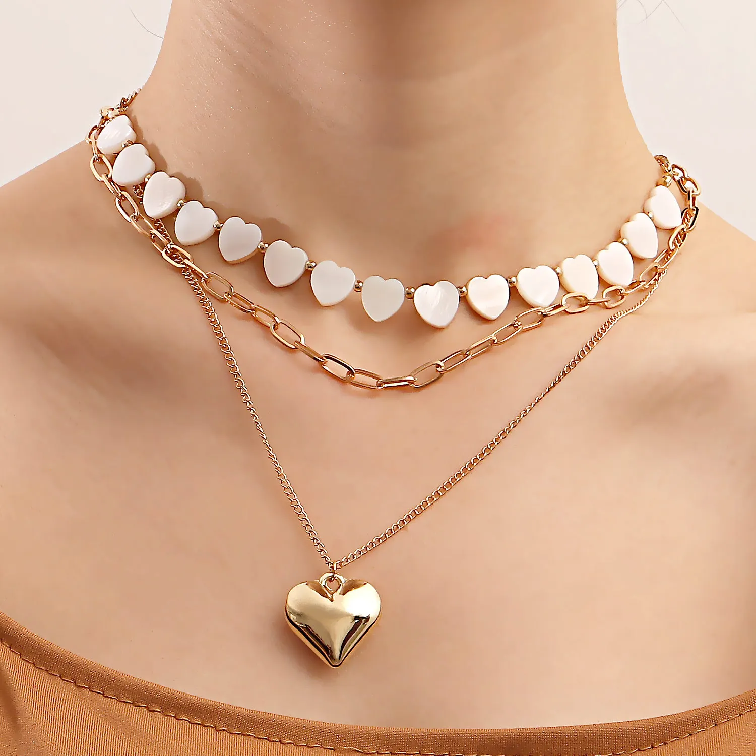 

Ins Multi-layer Imitation White Mother-of-pearl Love Pendant Multi-layer Necklace Exaggerated Big Peach Heart Sweater Chain