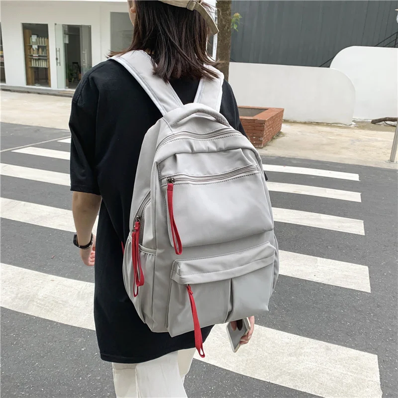 

Korean Women Backpack New Trend Men Oxford Solid Color Shoulder Backbag Female School Bag For Teenage Girls Male Travel Rucksack