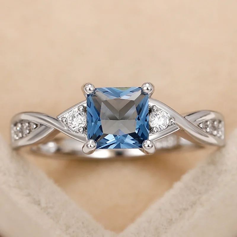 

Imitation square blue topaz platinum plated fashionable women's ring