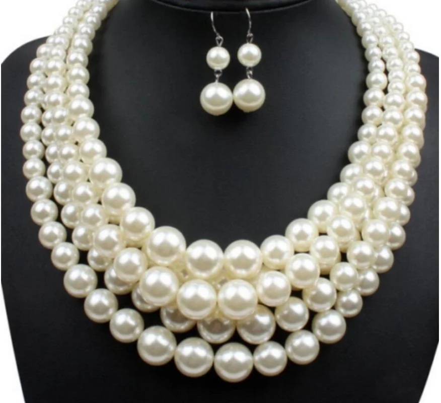 

Stunning 100'' 9-10mm South Sea White Pearl Necklace + Earring