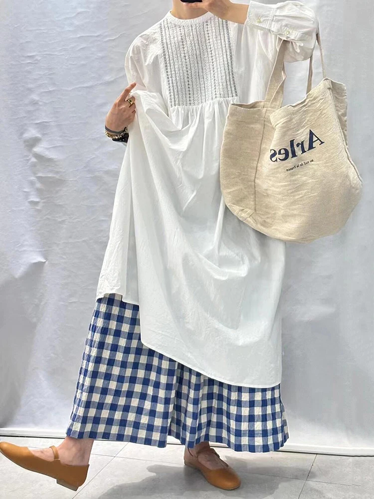 Женские клетчатые брюки в клетку с широкими штанинами