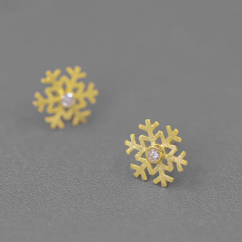 

Женские серьги-гвоздики из серебра 18 К с фианитами