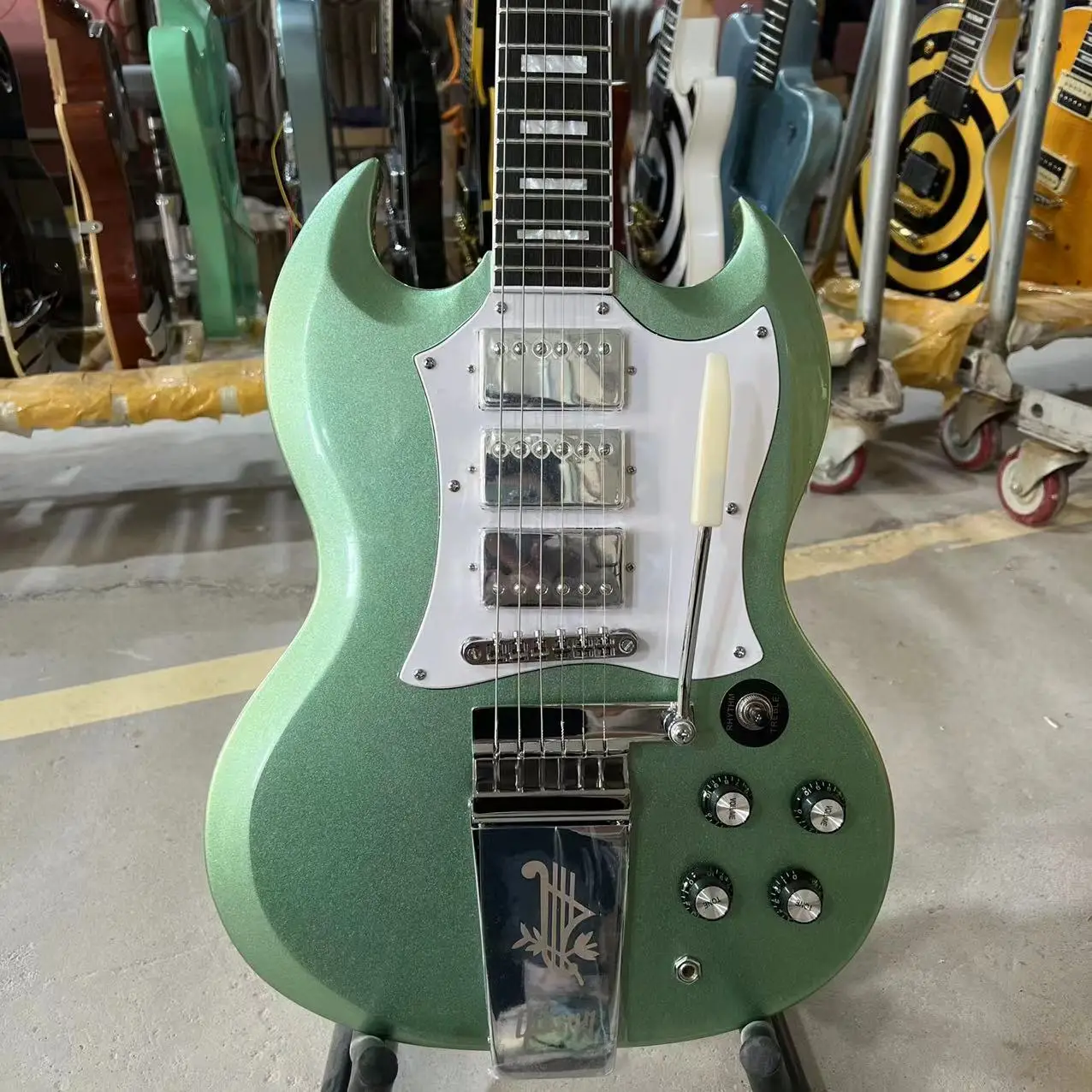 

Sg Electric Guitar Metallic Green Color Chrome Hardware Bigsby Tremolo System Mahogany Body Rosewood Fingerboard Free Shipping