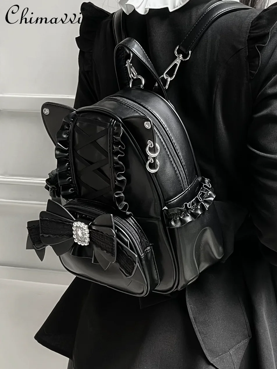 Женский рюкзак на молнии в японском стиле с кружевными вставками и бантом виде