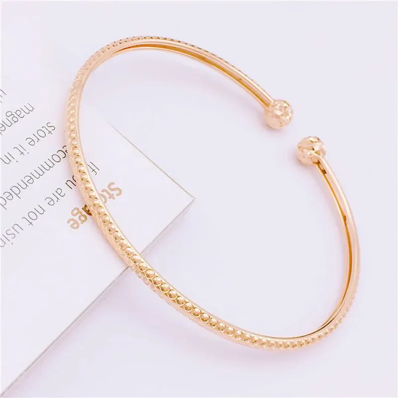 Женский браслет из розового золота 585 пробы с круглыми бусинами