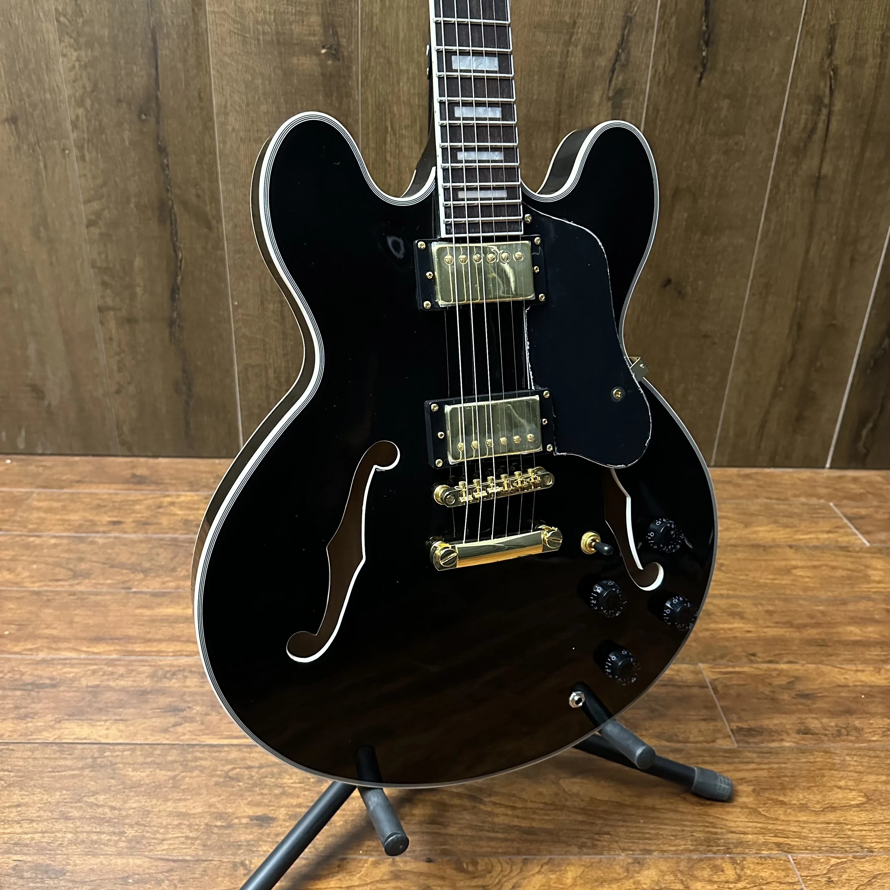 

ES335 semi-hollow electric guitar with jazz body and two H pickups with coil split feature 335 style jazz