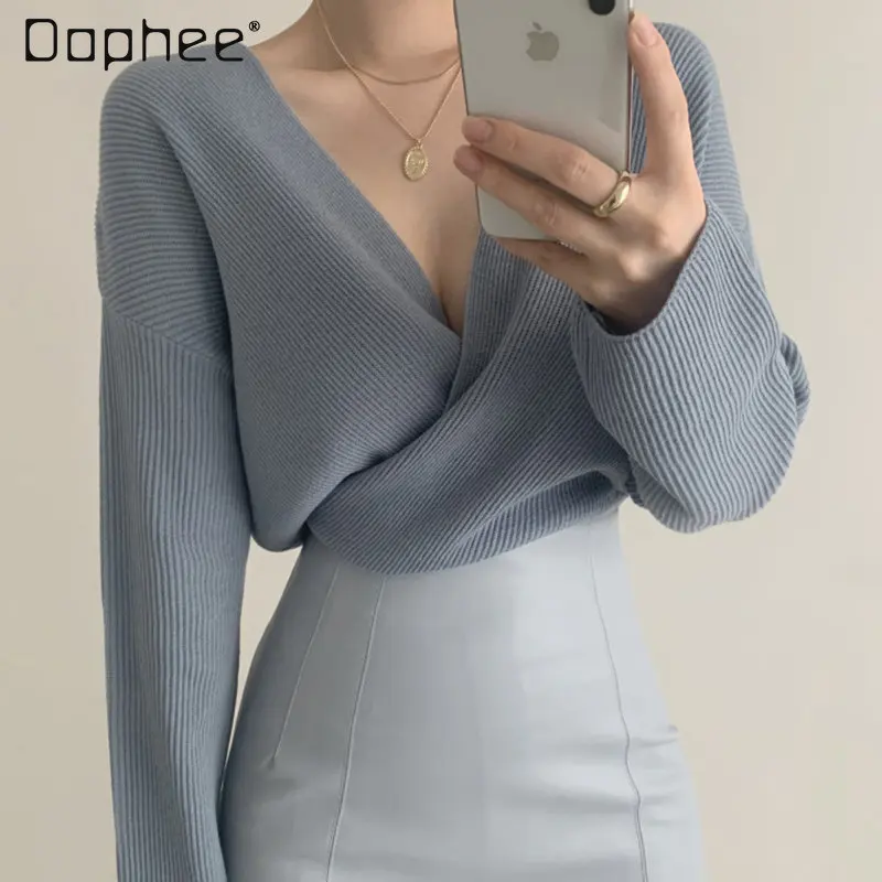 

Женский свитер с V-образным вырезом и длинными рукавами