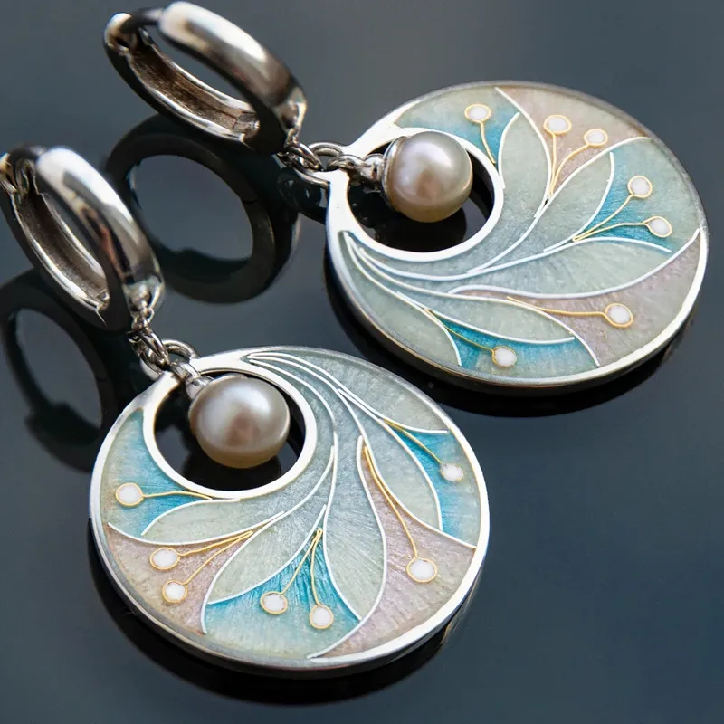 

Trendy Creative Round Imitation Pearl Earrings Gorgeous Metal Silver Color Paste Peacock Tail Colorful Dangle Earrings for Women