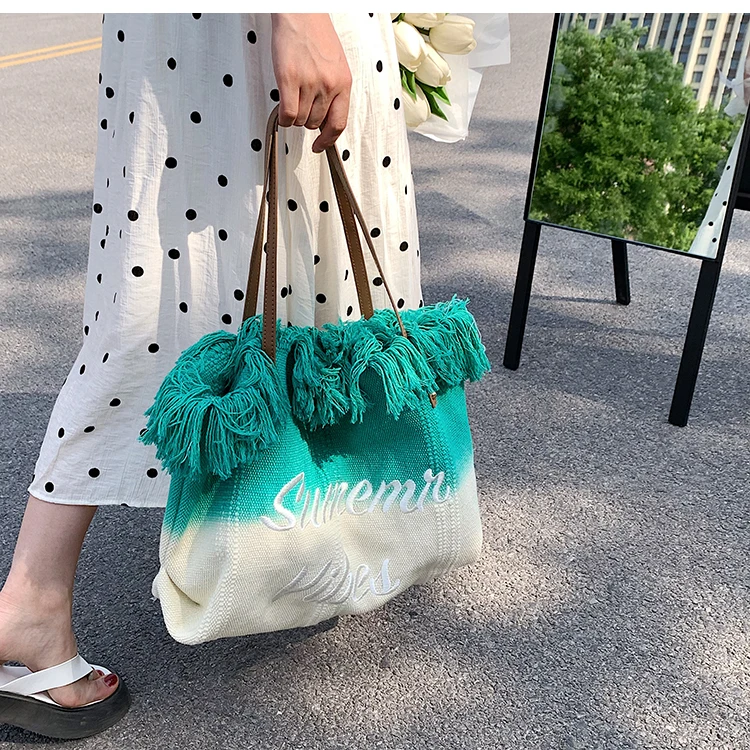 

Large capacity woven large bag women's 2022 summer popular new fashion versatile fashion tassel Shoulder Bag Tote Bag