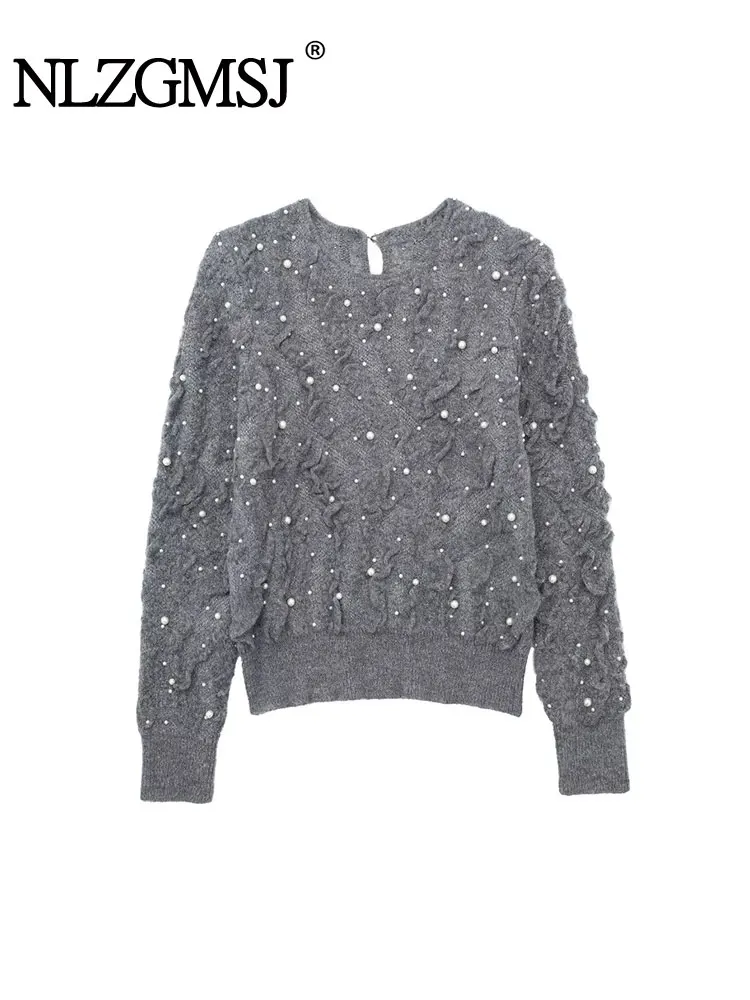 Женский вязаный свитер с искусственным жемчугом длинным рукавом