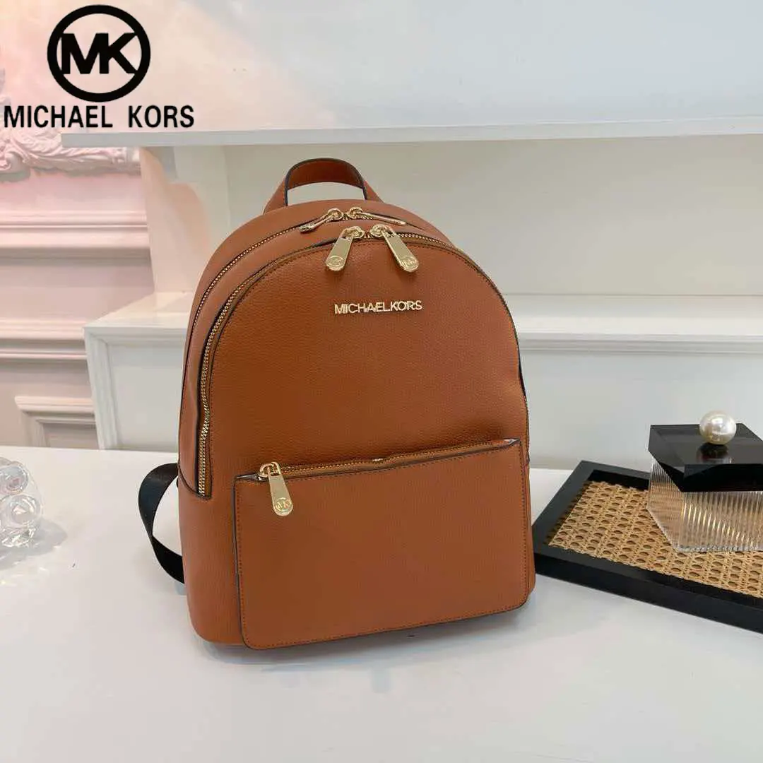 Фото Michael Kors Sheila Series 2026 Новый модный городской женский повседневный дорожный рюкзак большой вместимости, простой, из водонепроницаемого ПВХ-материала №2