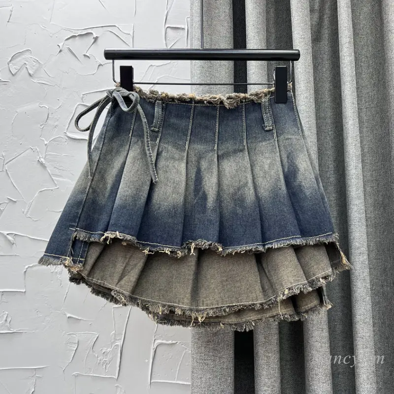 

European Fashion One-Piece Style Denim Skirt Woman Summer Hot Girl Ins Ripped Tassel Slimming Sheath Pleated Skirts Mini Jupe