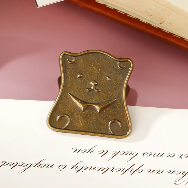 

Металлические зажимы для бумаги с медведем