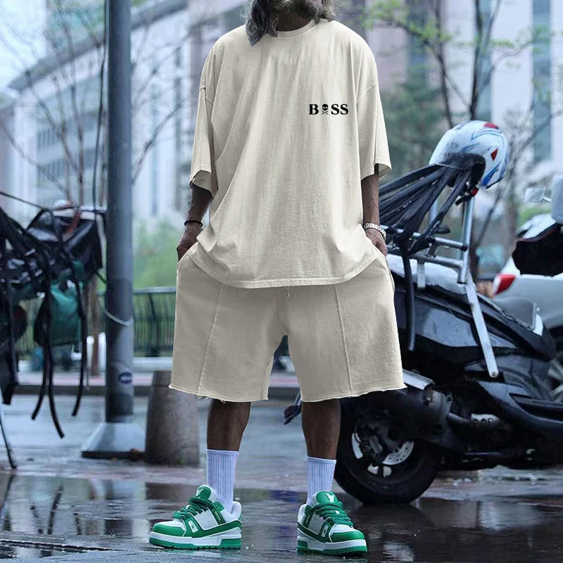 Summer Hot Sale Solid Color men's Street Trendy men's Casual Two-piece Short-Sleeved T-shirt + Loose Shorts