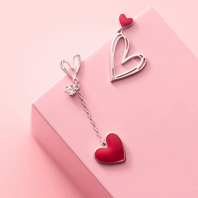 

Корейские новые асимметричные серьги-гвоздики в виде красного сердца для женщин, Необычные полые серьги с ЭКГ и кисточками, фотоаксессуары для девочек, ювелирные изделия в подарок