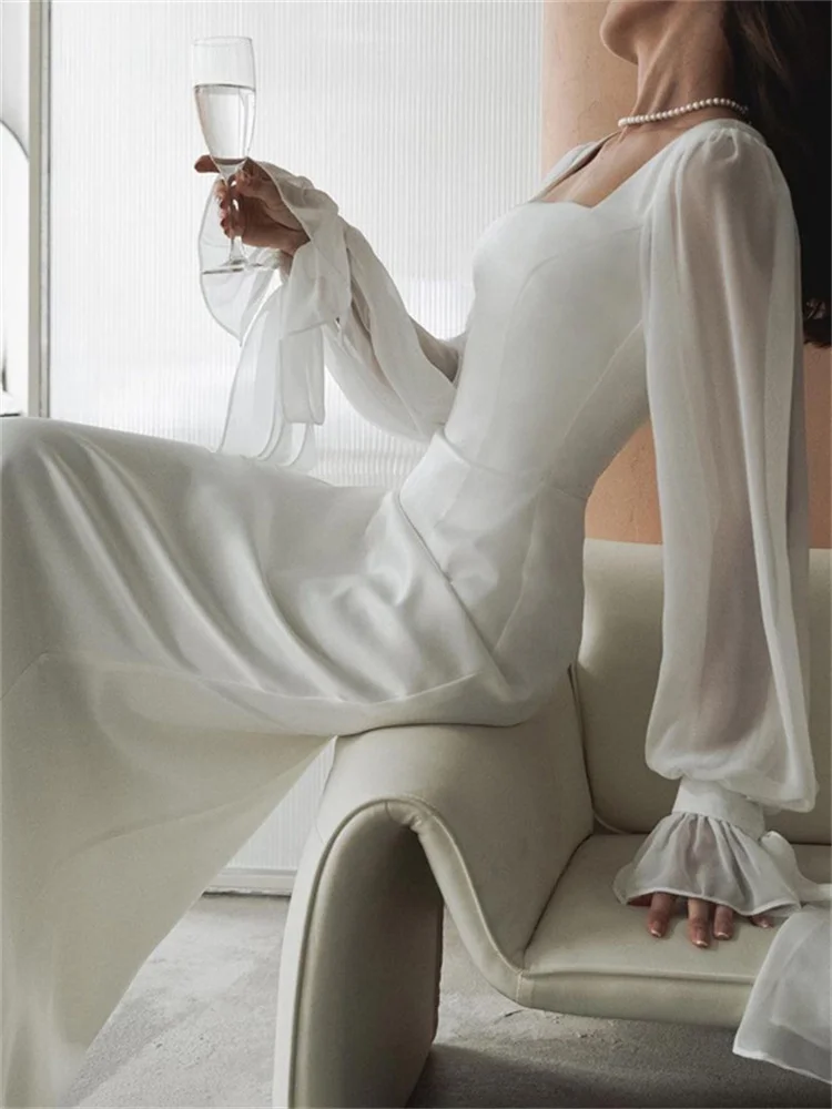 Женское длинное платье с оборками высокой талией и поясом