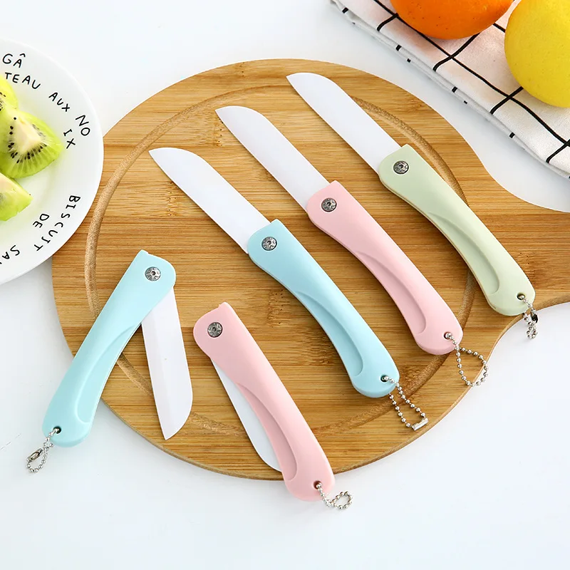 

Cuchillo de fruta Kawaii Sanrioed Anime serie de dibujos animados HelloKitty cerámica plegable para el hogar exquisito viaje por