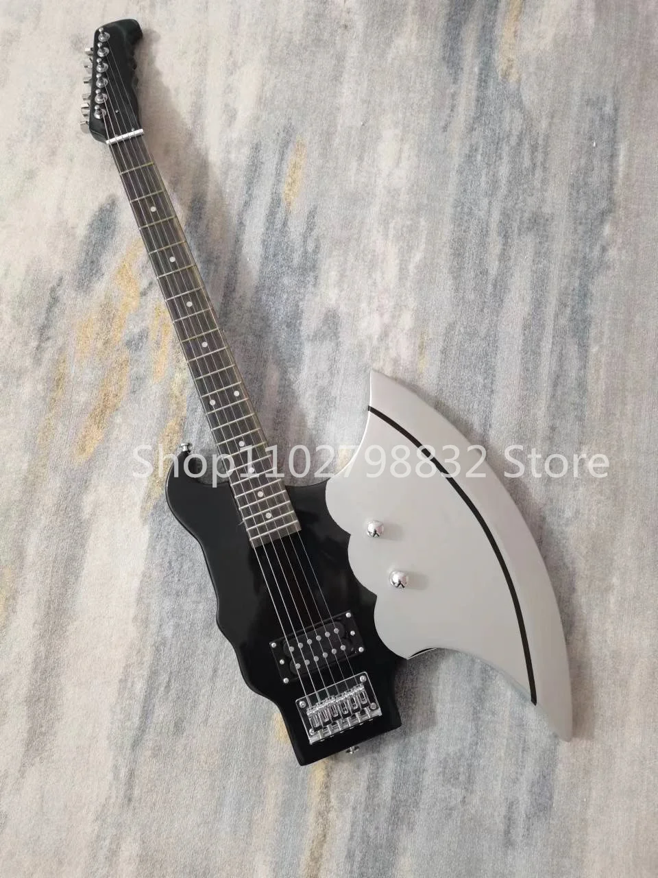 

6-string electric guitar, mahogany fingerboard, silver accessories, fixed bridge, free transportation