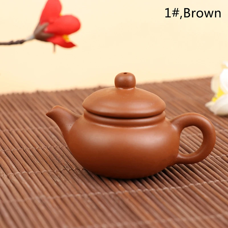 Пурпурный глиняный чайник для дома