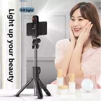 the new wireless bluetooth selfie stick foldable mini tripod with shutter remote control fill light for iphone 13 12