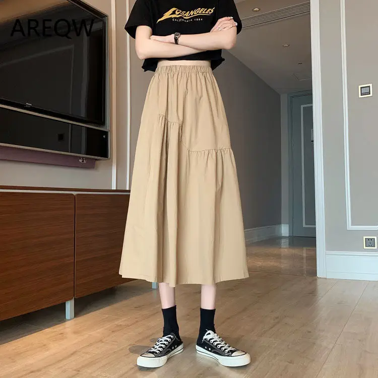 

2022 Summer New Korean Elastic Waist All-match Mid-length Black Skirt High Waist Cover Crotch A-line Skirt Women