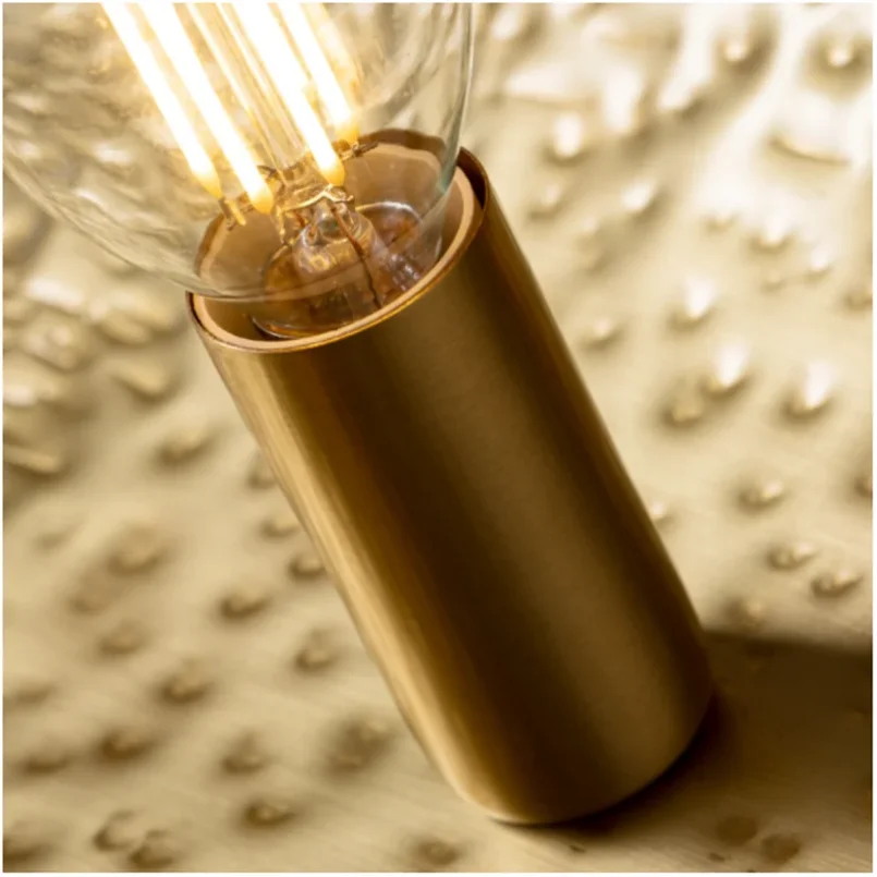 Подвесной светильник в виде листа медного цвета