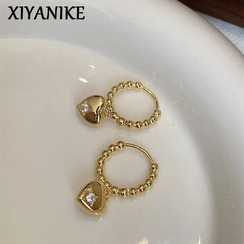 

XIYANIKE Vintage Metal Heart Dangle Earrings For Women Girl Fashion New Ear Piercing Jewelry Bosom Friend Gift Party серьги