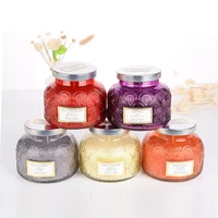 scented soy candles in glass jars