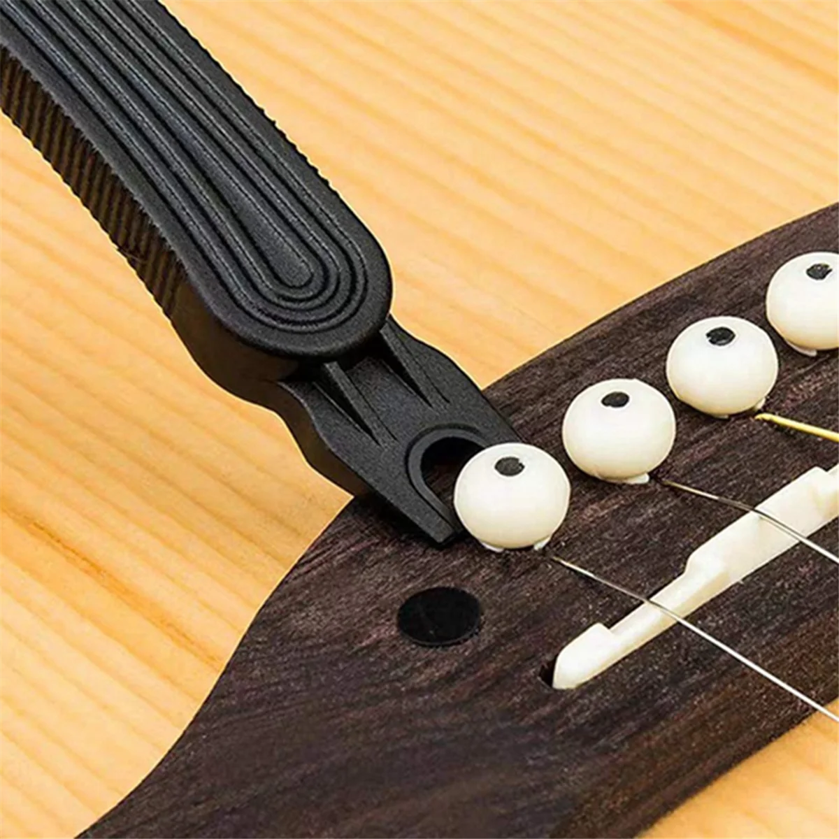 Устройство для намотки струн гитары и съемник мостовых штифтов 3 в 1