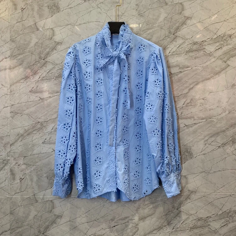 

Женский топ с рукавами-фонариками и галстуком-бабочкой