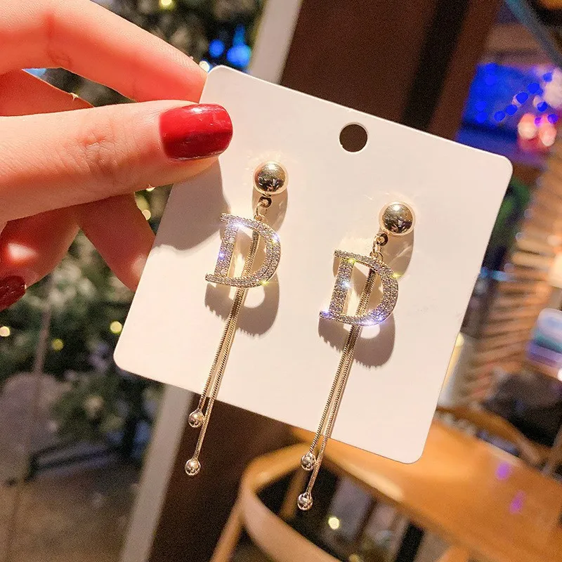 

Long 925 silver needle fringed earrings women's explosive face stud earrings premium design sense trend versatile earrings