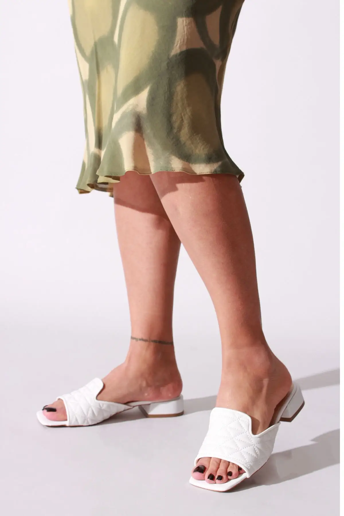 

Women white skin slippers