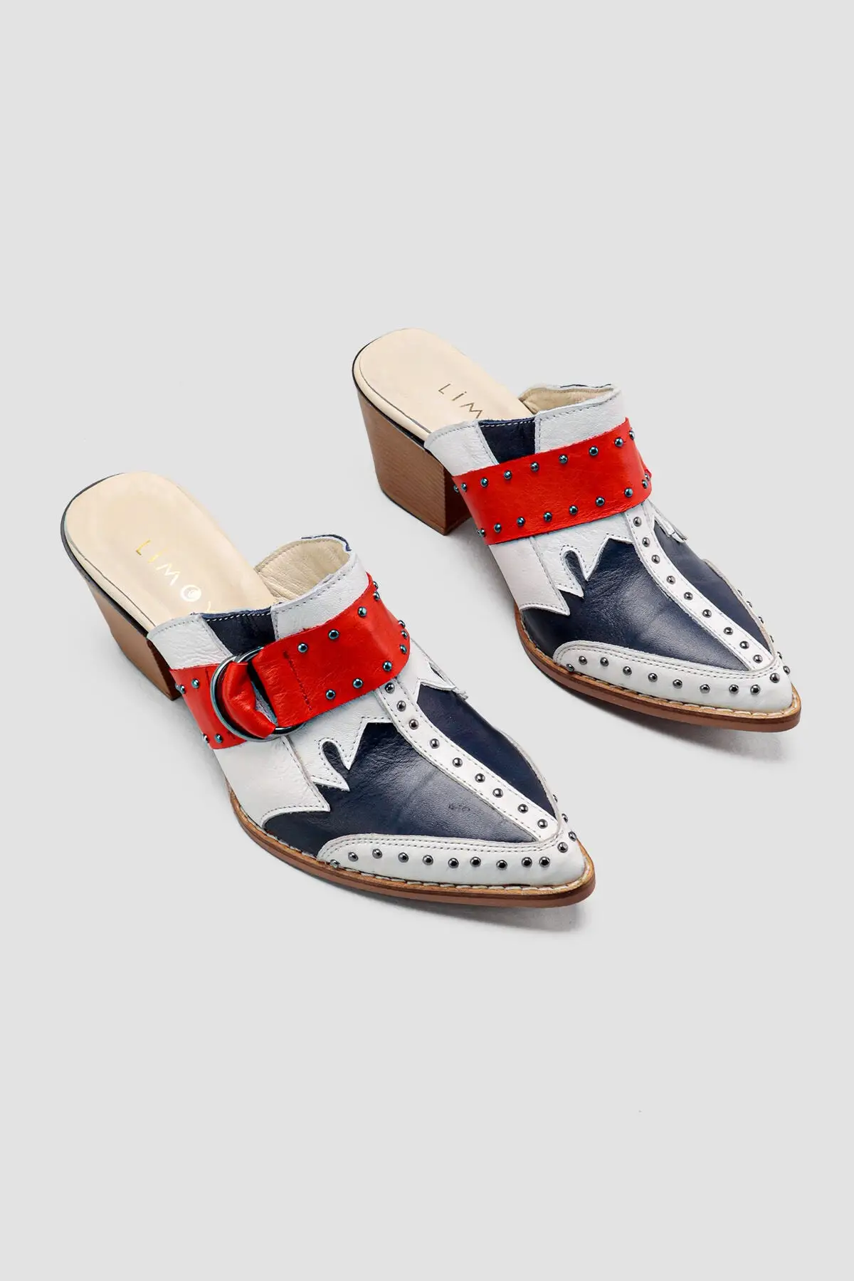 

Genuine Leather Jody Navy Blue Pointed toe Stapler Detailed Heels Slippers