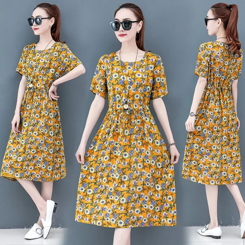 Элегантное женское утягивающее платье средней длины с цветочным принтом на