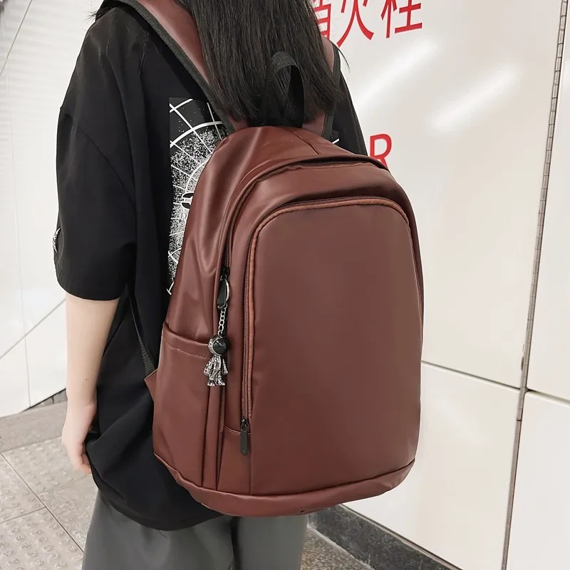Advanced retro backpack simple texture soft leather large-capacity computer backpack male high school college student women's sc