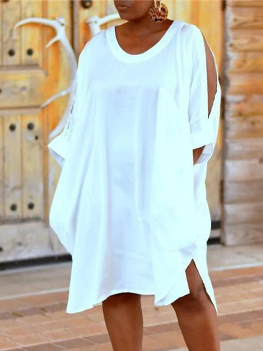 Женское платье с открытыми плечами асимметричным подолом и разрезом