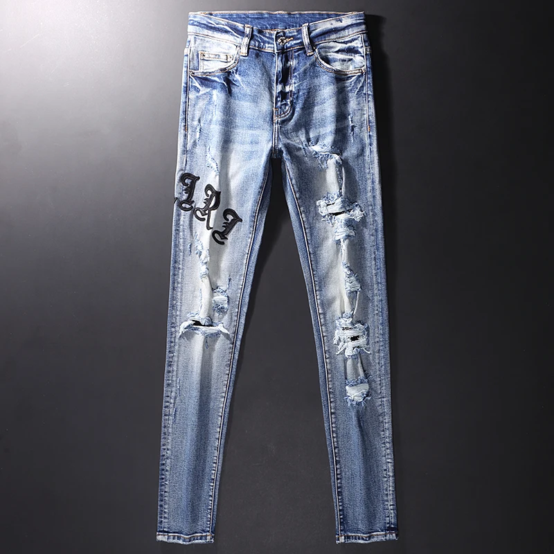 

Jeans Pria Mode Streetwear Jeans Sobek Ramping Biru Elastis Retro Tambalan Merek Homme Celana Denim Hip Hop Desainer Pria