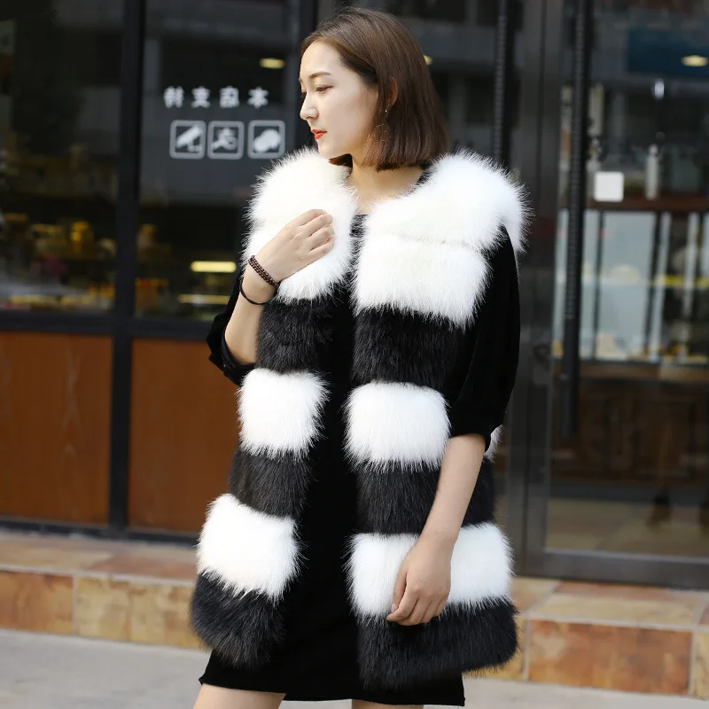 Autumn and winter long imitation fur vest splicing black and white Korean version imitation fox fur vest coat female new  coat