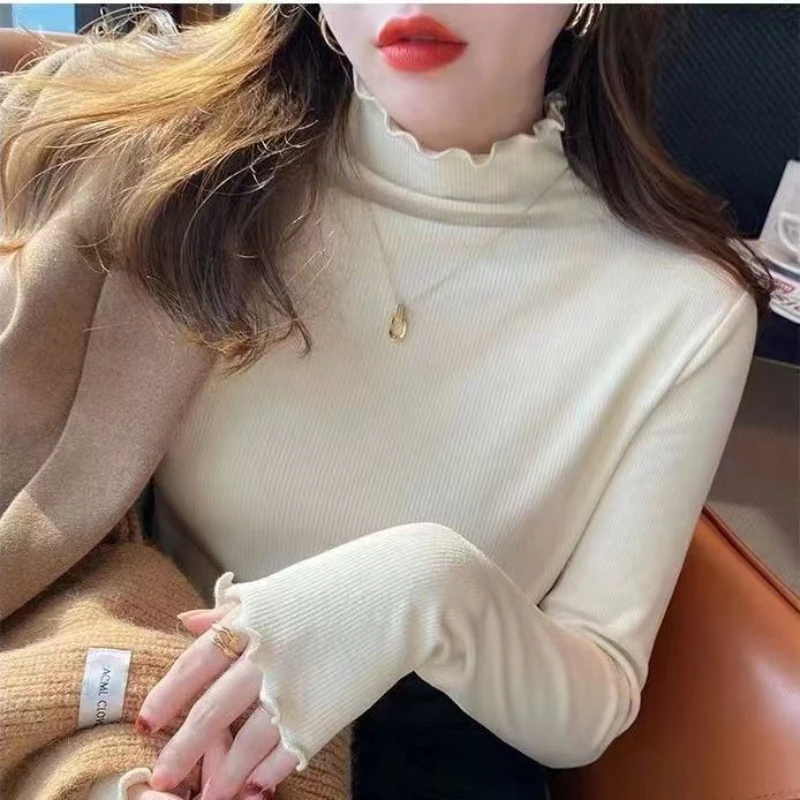 Женские пуловеры с воротником-хомутом и боковой нитью