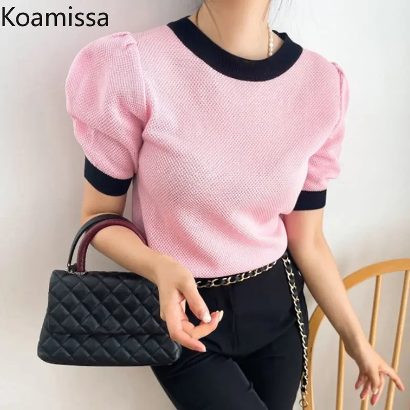 

Женский трикотажный пуловер с коротким рукавом и круглым вырезом