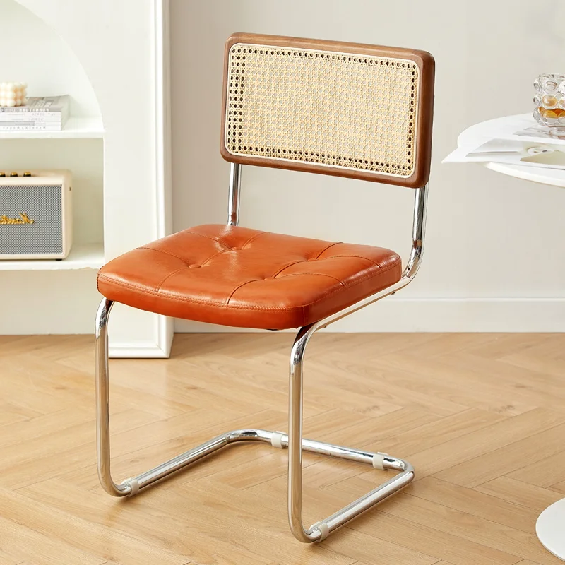 

Роскошные современные обеденные стулья из ротанга в скандинавском стиле, минималистичные металлические стулья с низкой спинкой для макияжа, дизайнерские стулья для гостиной с поддержкой, мебель Cadeira
