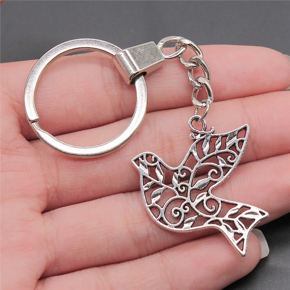 

Dropshipping Men Keychain Vintage 2 Colors 36x32mm Bird Pendant Souvenirs Gift