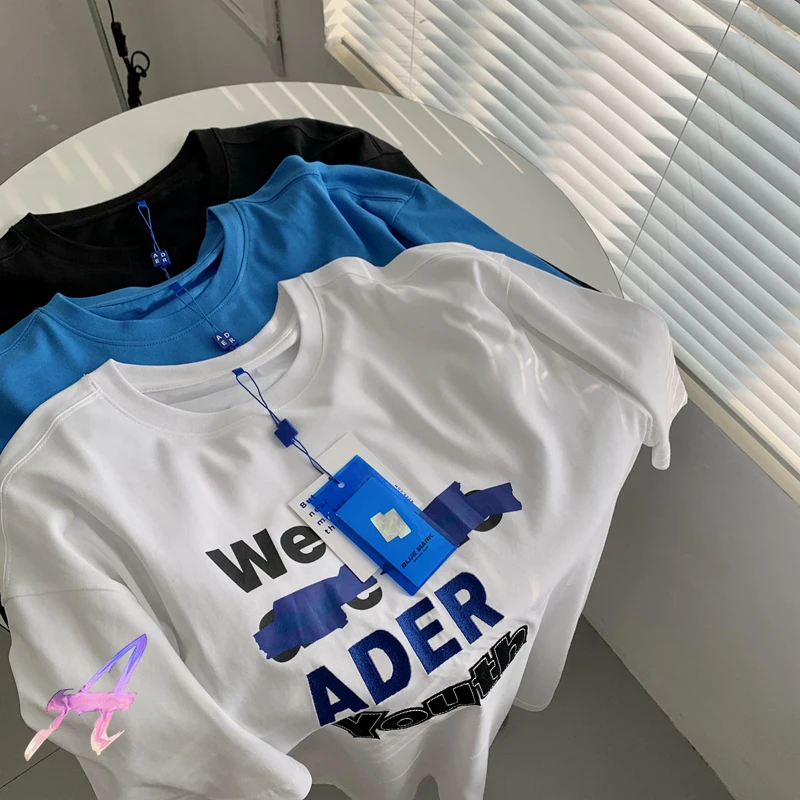 

ADER T-shirt Spring and Summer Men's Women's Slogan Graffiti Print T Shirt Best Quality Round Neck Loose Short Sleeves for Men