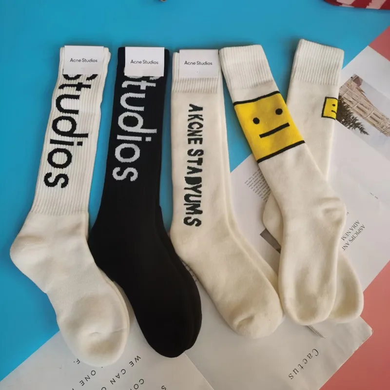 acne men and women long tube winter warm socks black and white letter expression socks