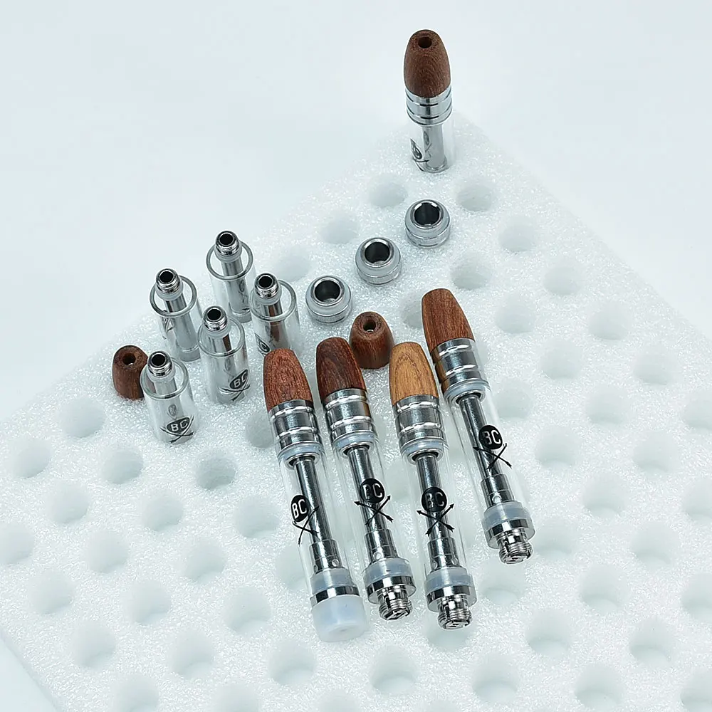 50pcs BC Wood Tip Thick Ceramic Coil Vaporizer Vape Cartridge Pens Carts Glass 0.8ml/1.0ml Cartridges CC-ELL Tank Oil