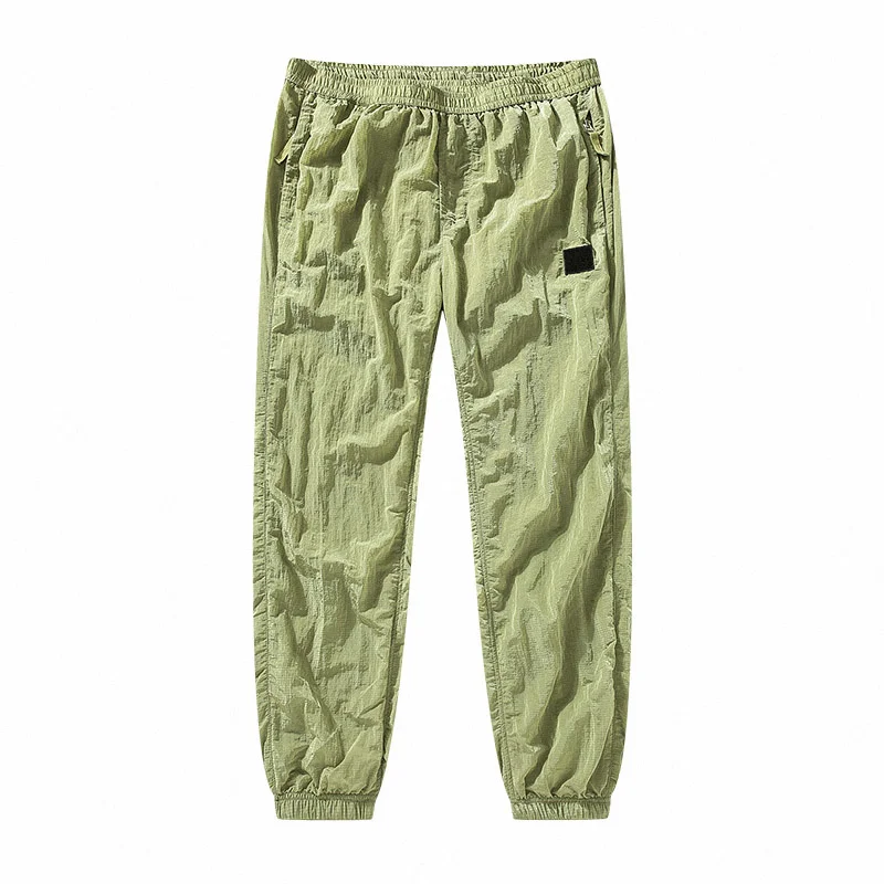 

men's metal seasons Four nylon high quality outdoor travel jogging men and women can embroider casual pants