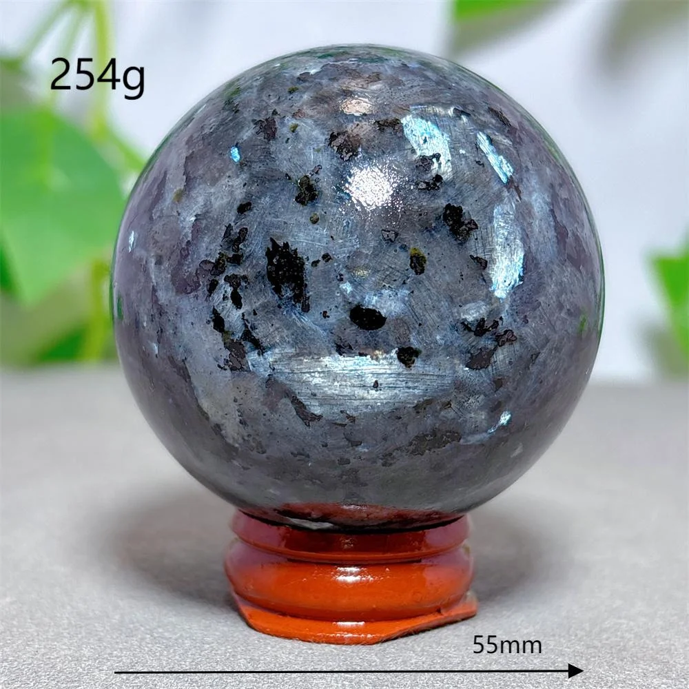 

Сферический кристалл ларви́т с черным турмалином